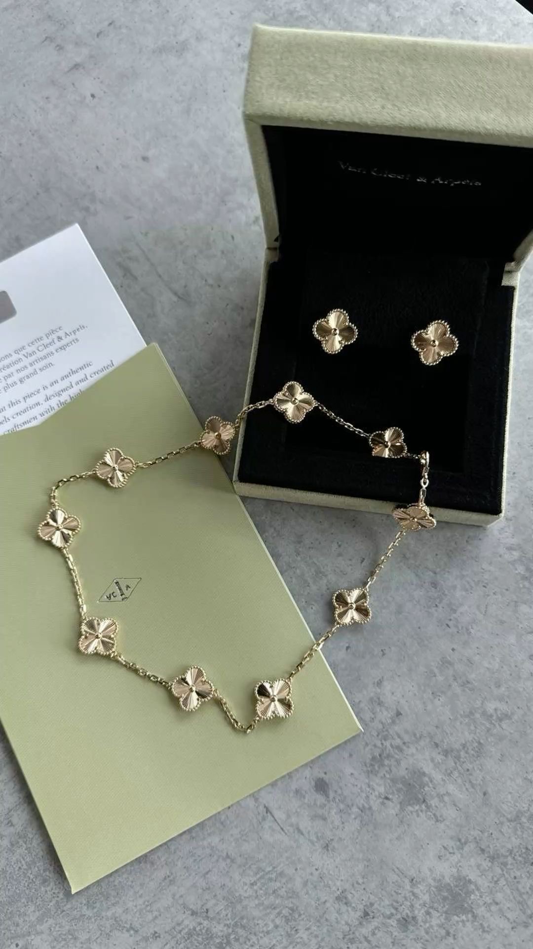 Vintage Alhambra 18K yellow gold guilloché necklace, bracelet and earrings from XII Jewellers